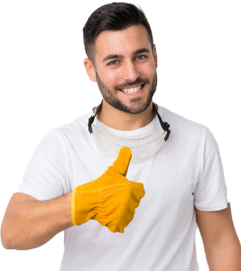 Smiling man in safety gloves giving a thumbs-up.